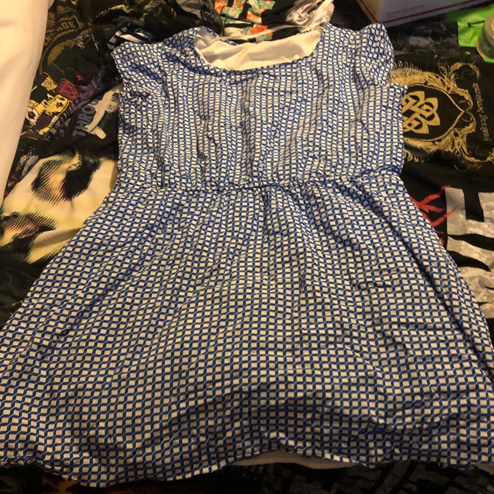 Blue and white checkered dress game brand